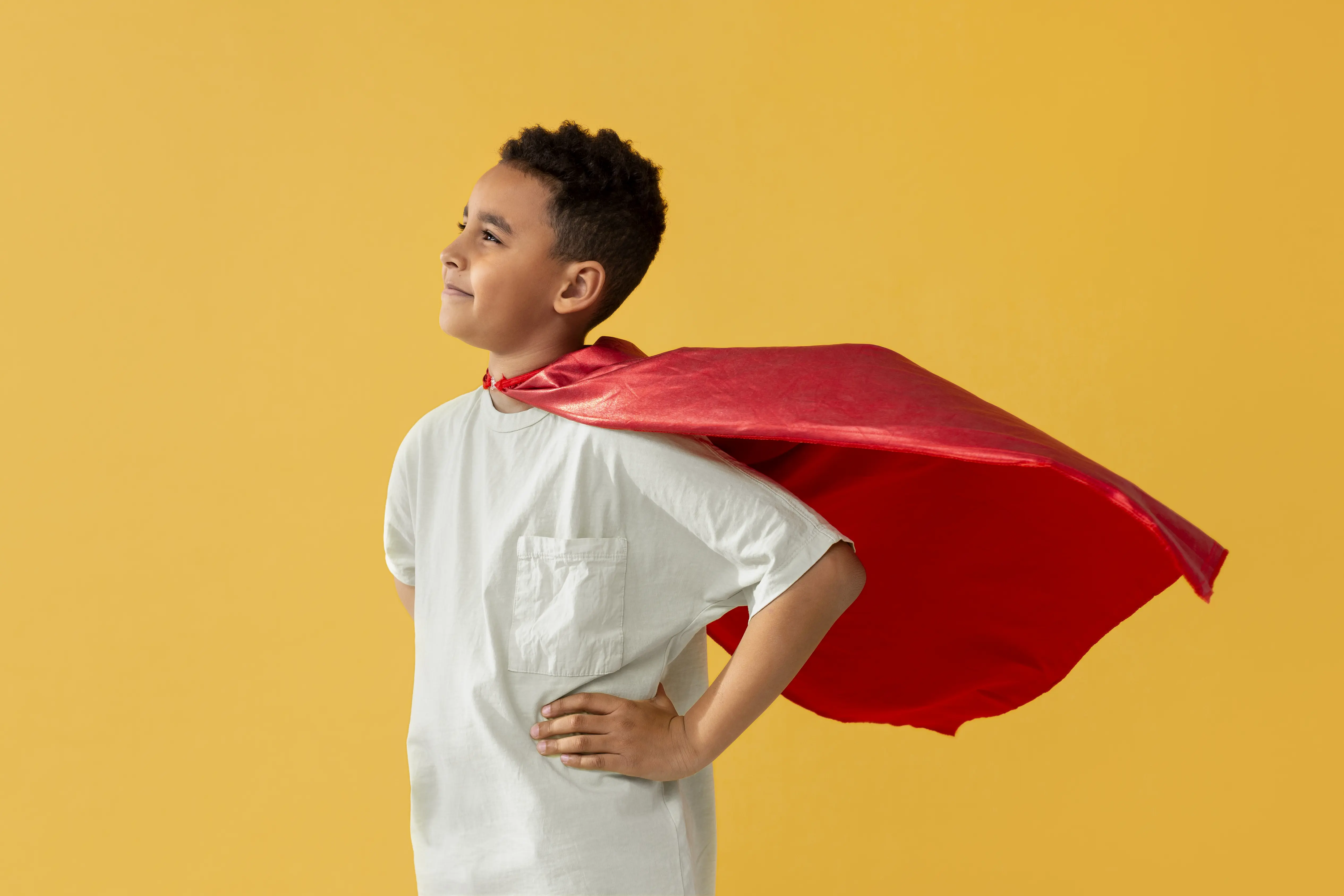 Portrait Young Boy With Superhero Cape (1)