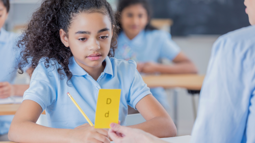 Students using flashcards to study