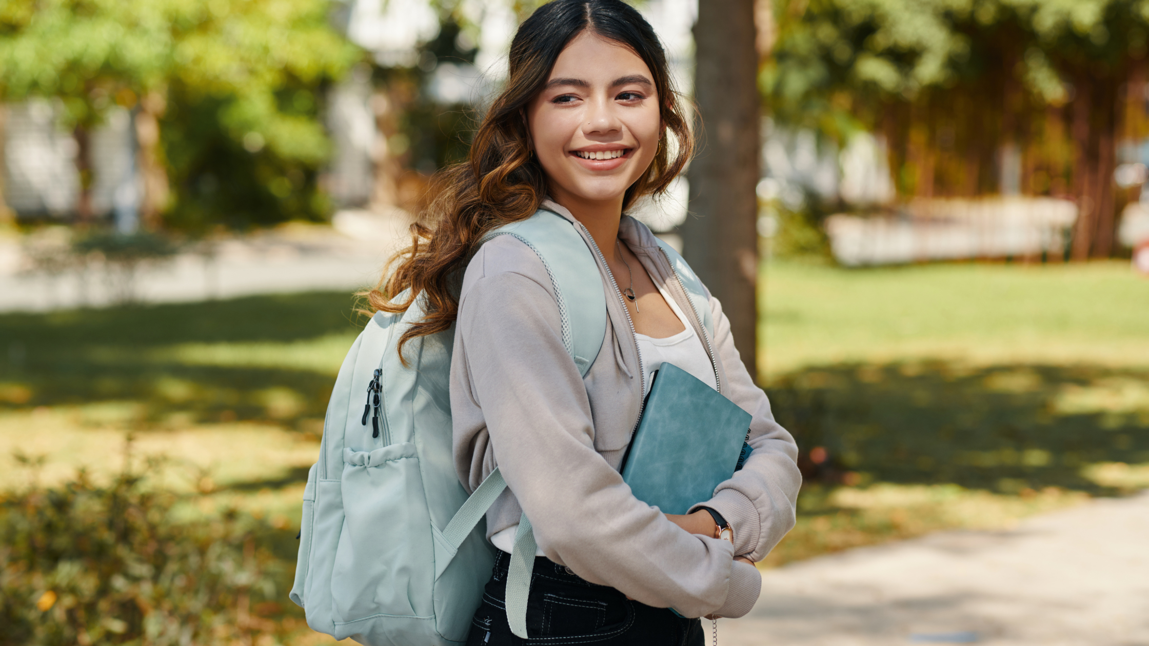 School Student With A Journal